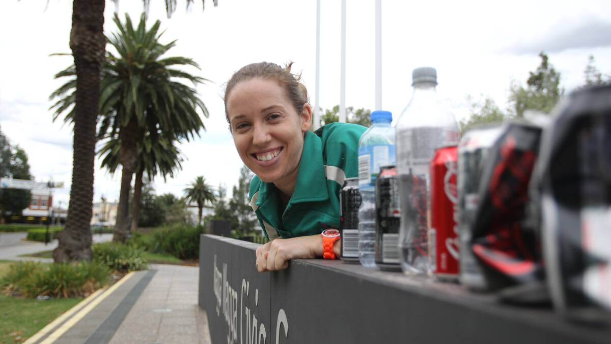 CLEAN-UP: Wagga City Council environmental education officer Alice Kent is happy with the announcement of the cash for cans scheme in NSW. Picture: Brodie Owen