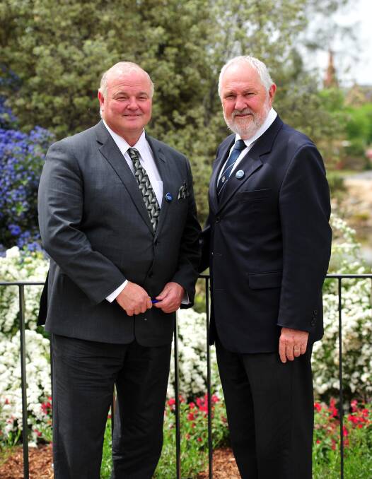NEXT IN LINE?: Half the council wants acting general manager Alan Eldridge (left), pictured with Wagga mayor Rod Kendall, to apply for a permanent gig. 