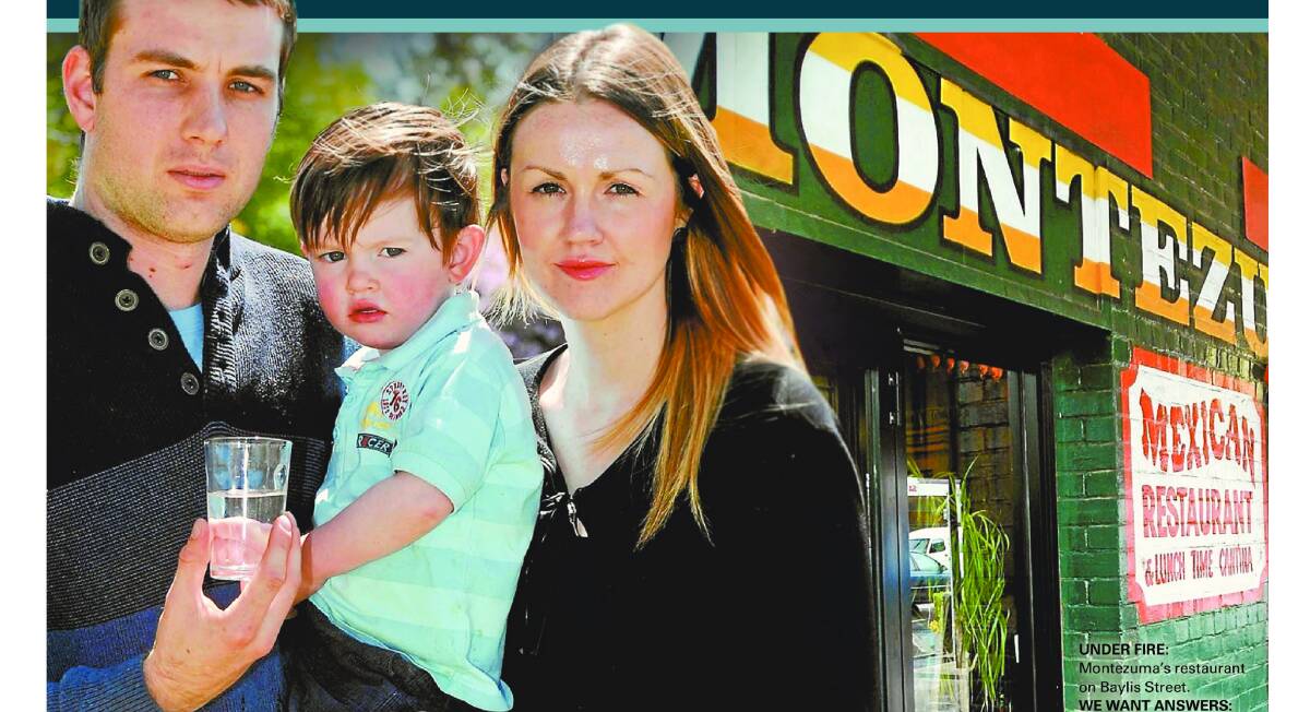 WE WANT ANSWERS: Robert and Eloise Nicoll, with two-year-old son Oliver, the day after the bleach scare. Picture: Les Smith