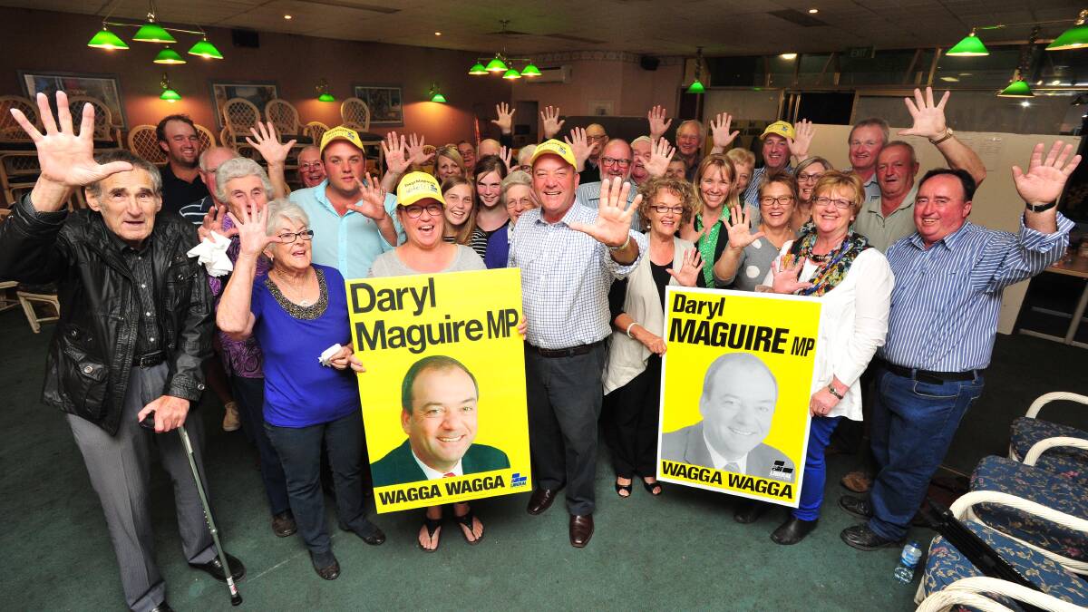VICTORY: Daryl Maguire celebrates his win with supporters at his campaign office. Picture: Kieren L Tilly
