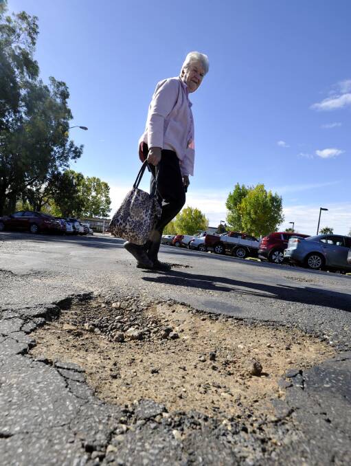 BITUMEN BANDIT: Regular Fitzhardinge Street driver Kay Geppart criticised the road's condition. Picture: Les Smith