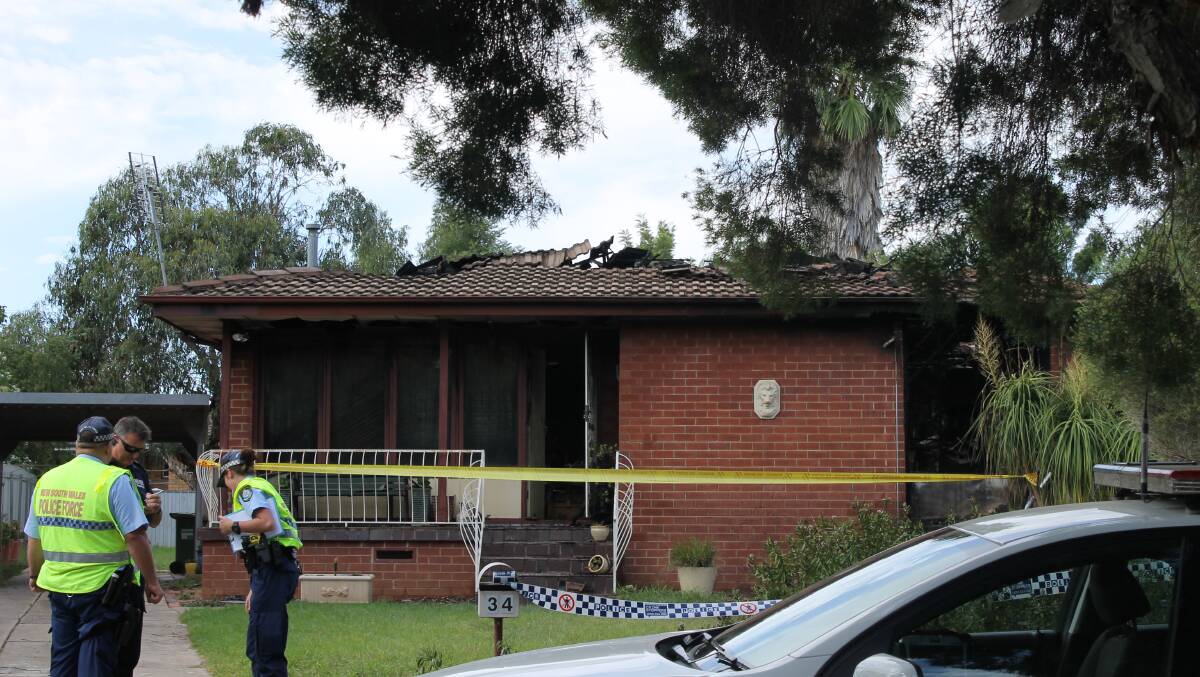 TORCHED: Police carrying out investigations after a blaze ripped through a Mumford Street home on Sunday morning. Picture: Brodie Owen