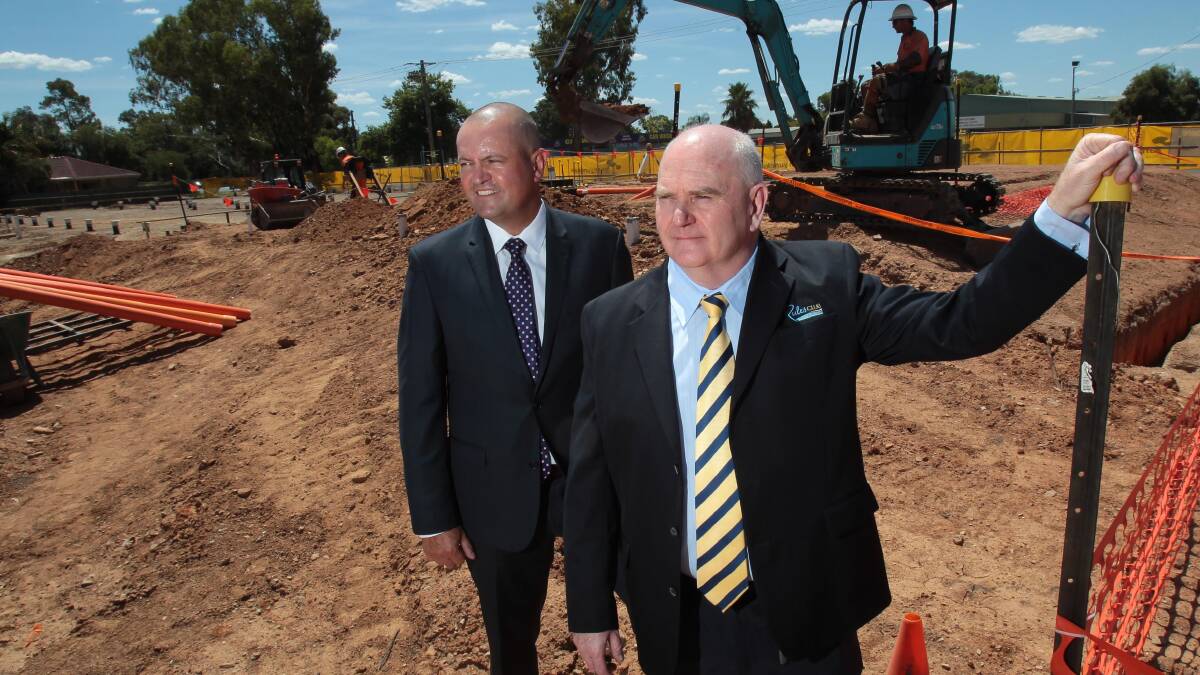 'CHEAPER, FASTER': Rules Club Wagga general manager Jack Jolley (front) and Choice Hotels Asia Pacific chief Trent Fraser at the new site, which is built with a modular design. 