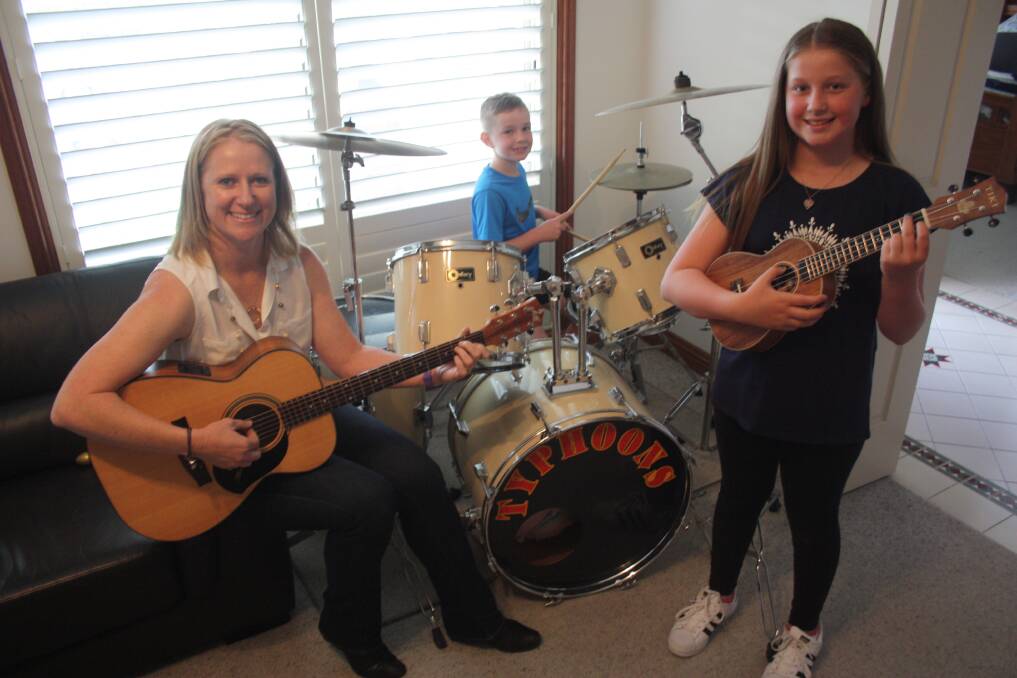Naomi Hocker, Caleb Hocker, 7 and Amelia Hocker 11 are a family band that will be performing at the Lutheran Sustainability Festival.