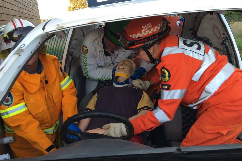 Crews from the RFS, VRA and SES go through a car accident simulation through CareFlight's MediSim. Picture: Contributed