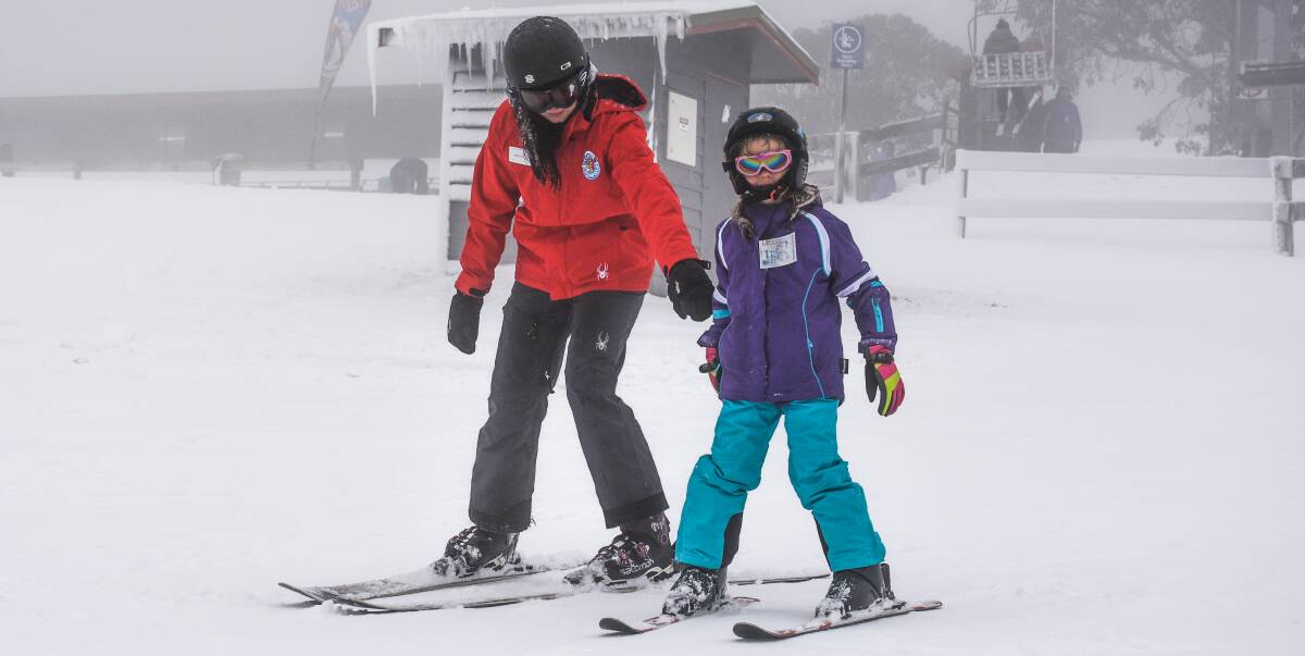 SNOW FUN: Ski instructor Kath Farr helps one of her students at Selwyn Snowfields on Thursday. Picture: Selwyn Snowfields