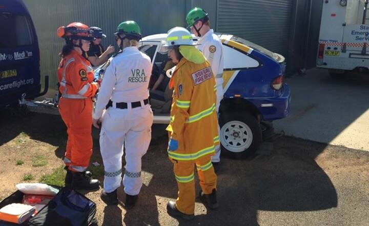 Crews from the RFS, VRA and SES go through a car accident simulation through CareFlight's MediSim at the weekend. Picture: Contributed