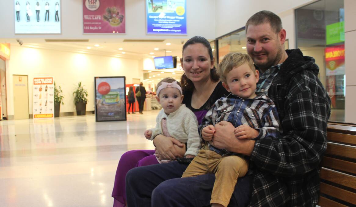 SAVING: (back, from left) Jypsie Geppert and fiance Beajey Cronan with their two children (front, from left) Matylda, 8 months, and Malakye, 2. 