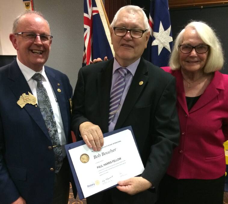 HONOUR: (From left) Rotary District Governor Gary Roberts, Paul Harris Fellow recipient Bob Bowcher, and Bob's wife, Doris. Picture: Contributed