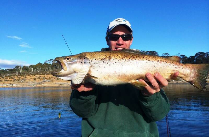 TOP TROUT: Brendan Twitt with a brown trout caught in Lake Eucumbene. Picture: Contributed
