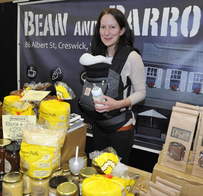WHOLESOME: Sally Taylor with her son, Alex, 3 months, at the Bean and Barrow stall. Picture: Les Smith