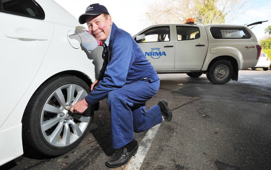 UNDER PRESSURE: Wagga NRMA Road Service patrolman Jeff Lange gets called out to up to two or three tyre changes a day. Picture: Kieren L Tilly