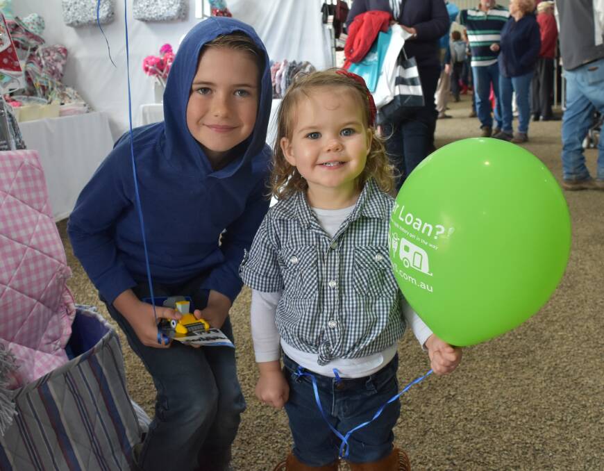 EXCITEMENT: Harry and Eliza Feuerherdt, from Walla Walla, at the Henty Field Days last week. Picture: Lorri Roden. 