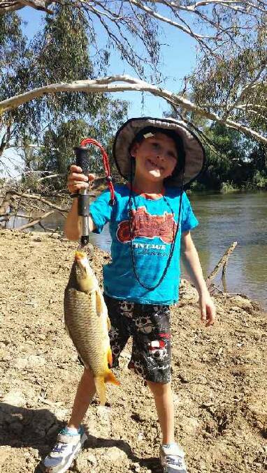 BIG FISH: Jai Lane caught a carp on the Murrumbidgee river last week. Picture: Contributed
Send your photos to craig@waggamarine.com.au or 0419 493 313.