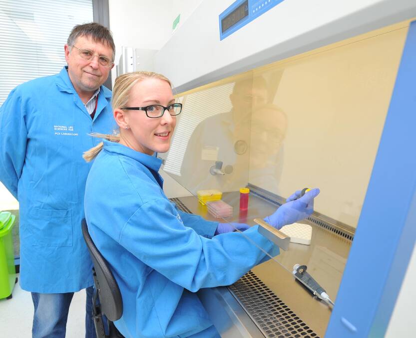 Charles Sturt University School of Biomedical Science's Dr Michael Cahill and PhD student Sarah Williams.