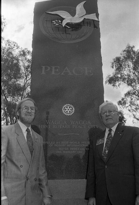 Tony Quinlivan pictured with former president of Rotary International Royce Abbey at the Wagga Peace City monument not long after it was unveiled.