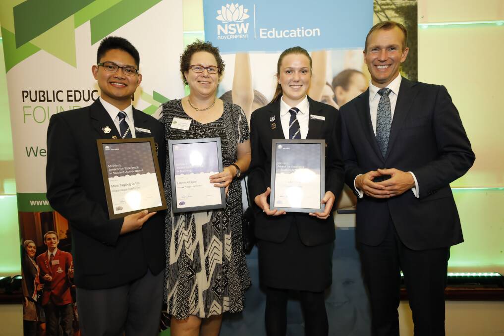 RECOGNITION: Marc Tagalog Doble, Leonie Atkinson and Sarah Crakanthorp of Wagga High School,, with Minister for Education Rob Stokes, who presented the awards of excellence.