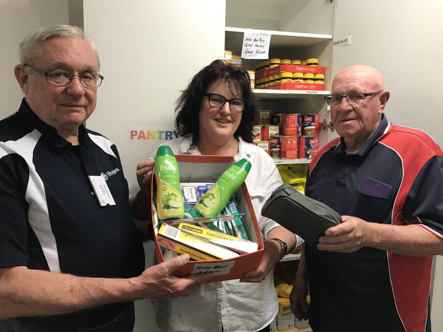 RESTOCK: St Vincent de Paul volunteers Jeff Moore, Shen Melbourne and Doug Kinder are hoping for lots of donations to top up the charity's stocks.