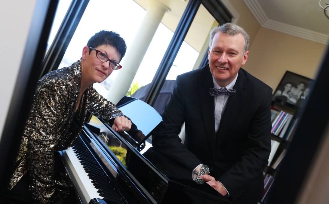 SOUND OF MUSIC: Wagga academic Leigh Ladd, who has recently attained a prestigious musical qualification, with his music teacher, Marie-Cecile Henderson, in her home studio. Picture: Emma Hillier