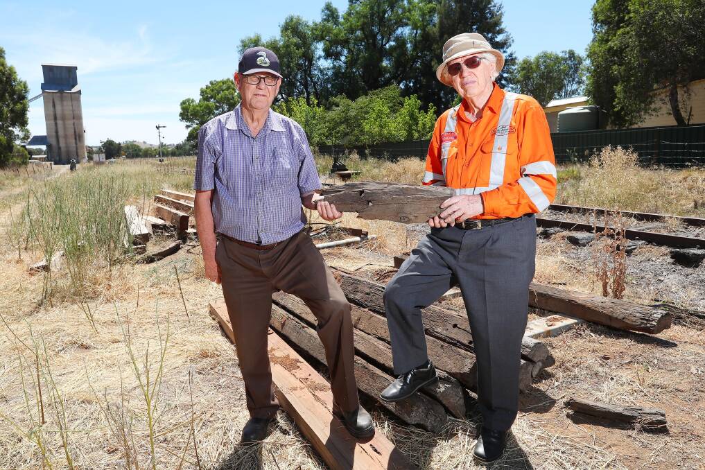 DEVASTATED: Wally Bell, treasurer of Ladysmith Tourist Railway and chairman Richard Goodman at the scene of the crime. Around 130 sleepers were stolen from beside the track earlier this month. Picture: Kieren L Tilly