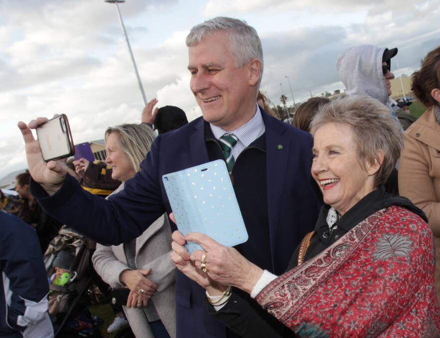 NEW ROLE: Newly sworn in Deputy Prime Minister and Member for Riverina Michael McCormack at the 2016 Farrer League grand final with the former member, Kay Hull.