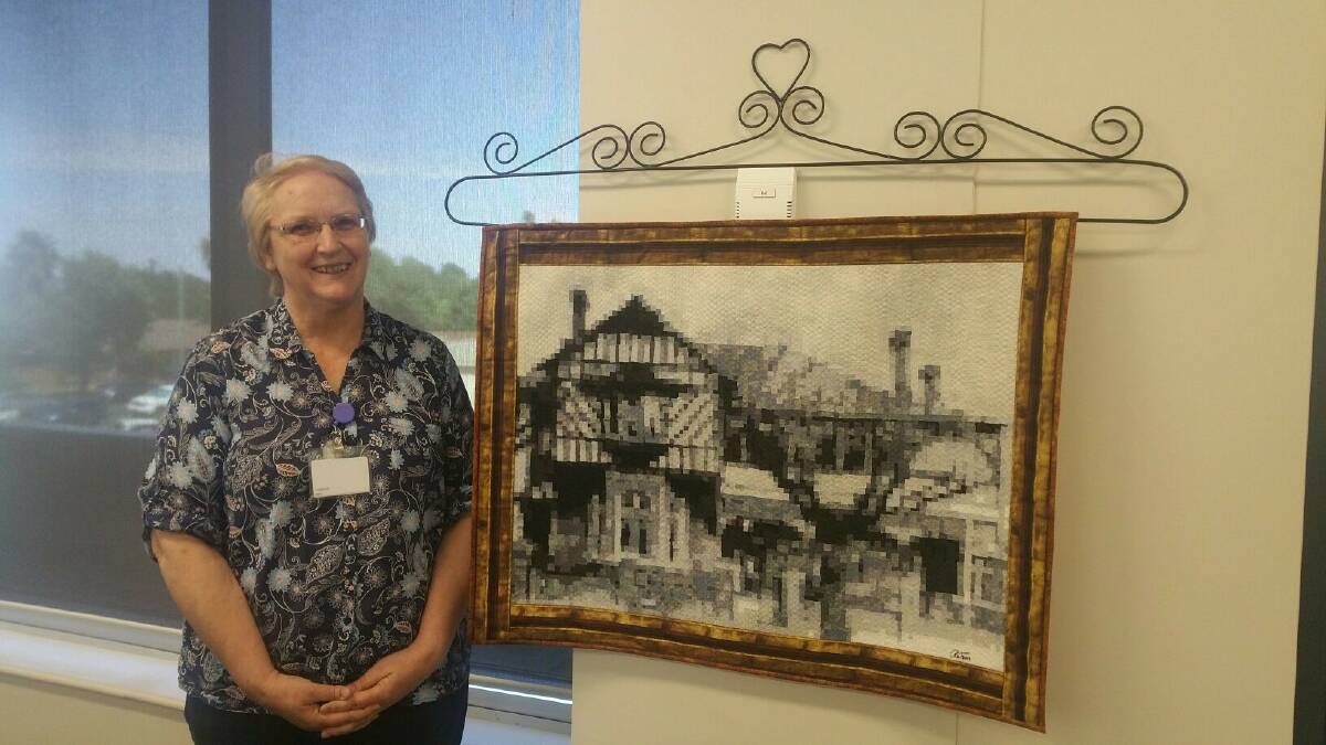 ART AUCTION: Robyn Taylor has donated this fabric mosaic of the Wagga Manor House to a charity art auction.