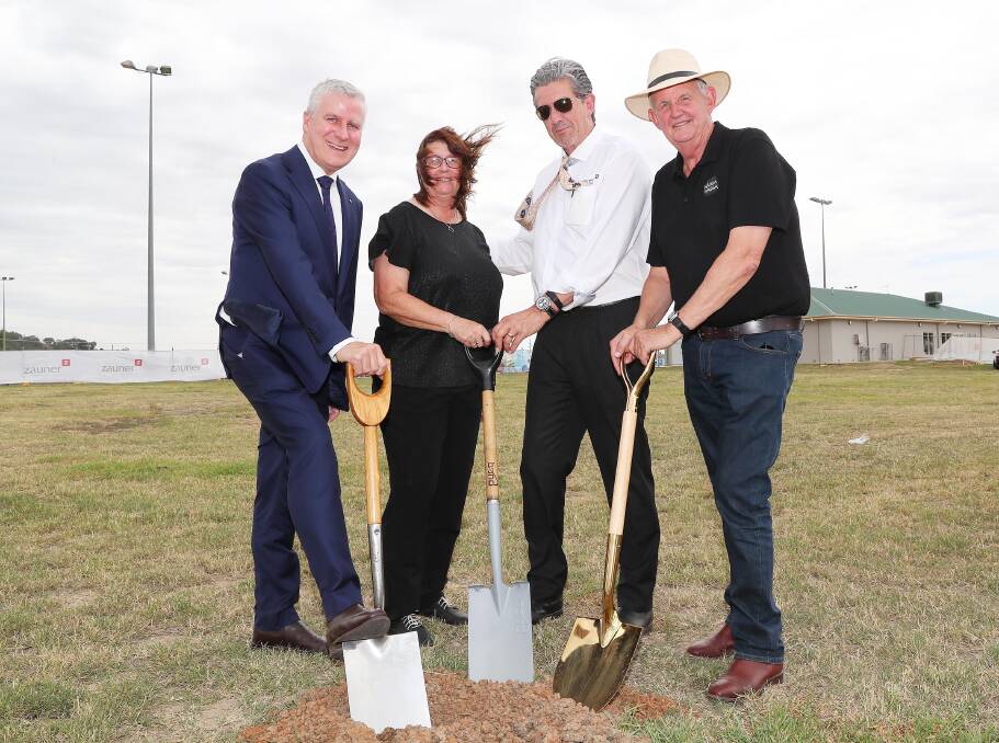 GAME ON: Member for Riverina Michael McCormack, president of Wagga Netball Association Rosemary Clarke, director of Zauner Construction Garry Zauner and Wagga Mayor Greg Conkey turn the first sod. Picture: Kieren L Tilly