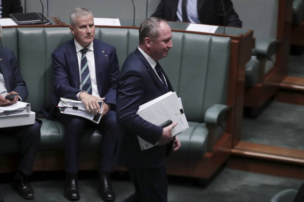 IN THE HOUSE: Member for Riverina Michael McCormack and his embattled party leader Barnaby Joyce in Parliament on Wednesday. Picture: Alex Ellinghausen