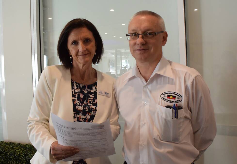 Julie Redway of the Murrumbidgee Primary Health Network and RivMed's Darren Carr.