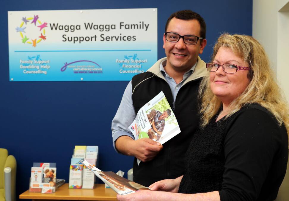 HELP AND SUPPORT: Nick Georgiou and Julie McDermott from Wagga Family Support Services are offering help for gambling issues. Picture: Les Smith