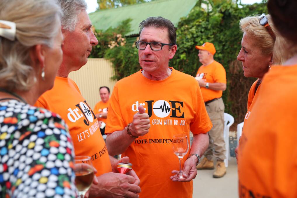 Wagga's independent MP Joe McGirr chats with supporters.