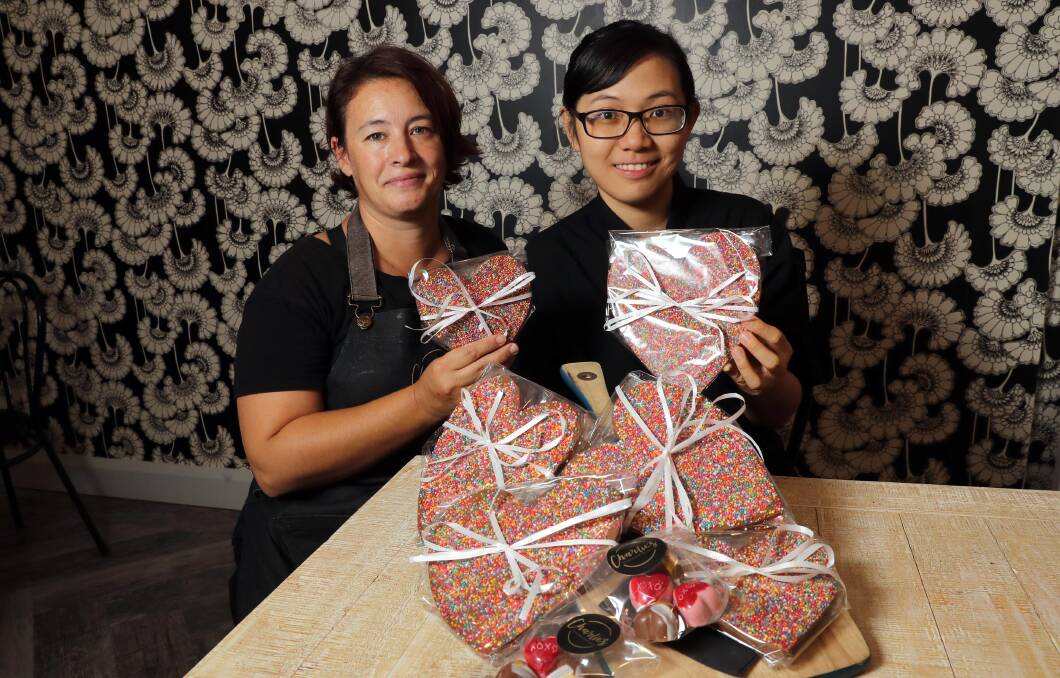 SWEET HEARTS: Simone Beer, the manager of Charlie's Chocolatier and Patisserie, and chocolatier Pearly Quah with some sweet treats. Picture: Les Smith