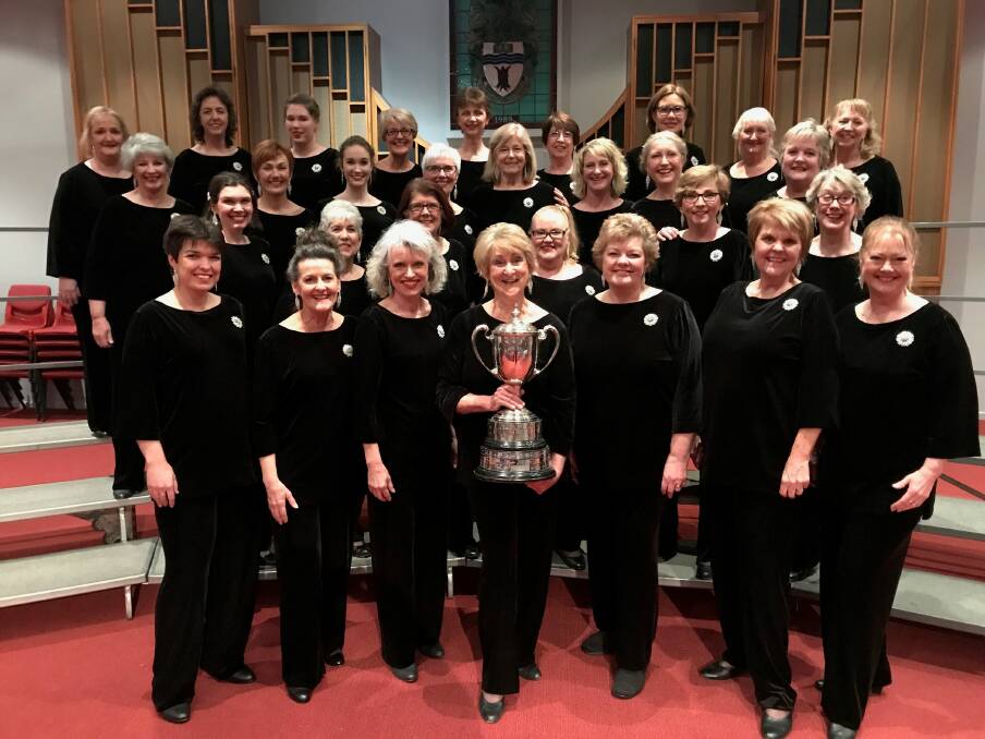 TOP PERFORMERS: Members of Murrumbidgee Magic with the Eva Copland Cup, which they won at the Wagga Eisteddfod.