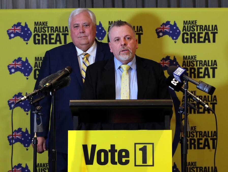 The United Australia Party's candidate Richard Foley (front), with party founder Clive Palmer, campaigning in Wagga.
