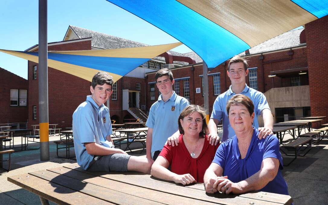 GOODBYE: Fay Gordon is retiring from Wagga High School, where her daughter Angela Angel also works and her grandsons,  Lachlan Angel, 13, Josh Angel, 15 and Ryan Hilder, 13, are students. Picture: Les Smith.