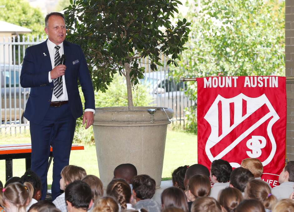 Detective Sergeant Phil Malligan addresses students at Mount Austin High School. Picture: Kieren L Tilly