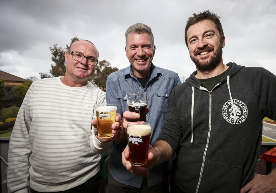 CHEERS: Great Australian Beer Festival co-organisers Michael Ward, Pete Mitcham and Kieran Blood share a cold one to launch the Albury festival. Picture: JAMES WILTSHIRE