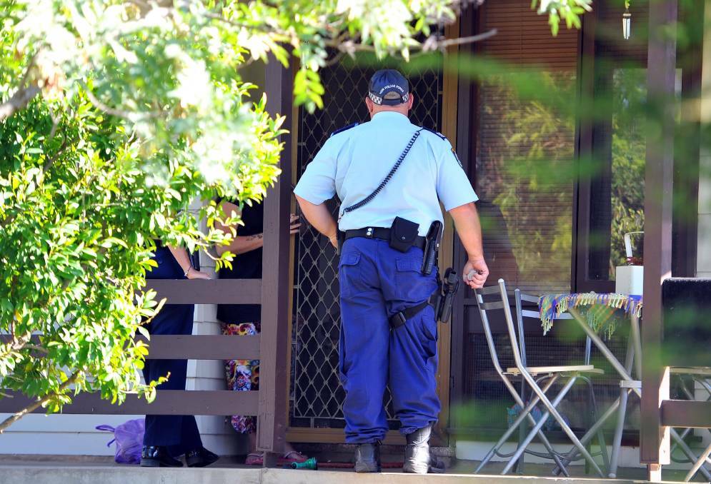 HUNT IS ON: Police scoured the Tolland neighbourhood in search of the Dareton teen, who allegedly fled a drug rehabilitation centre and breached his bail. 