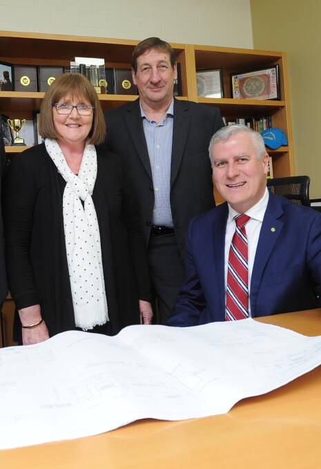 FUNDING BOOST: Michael McCormack, Cathie Smith and Ray Carroll met on Friday to announce the $1.2 million cash splash. 