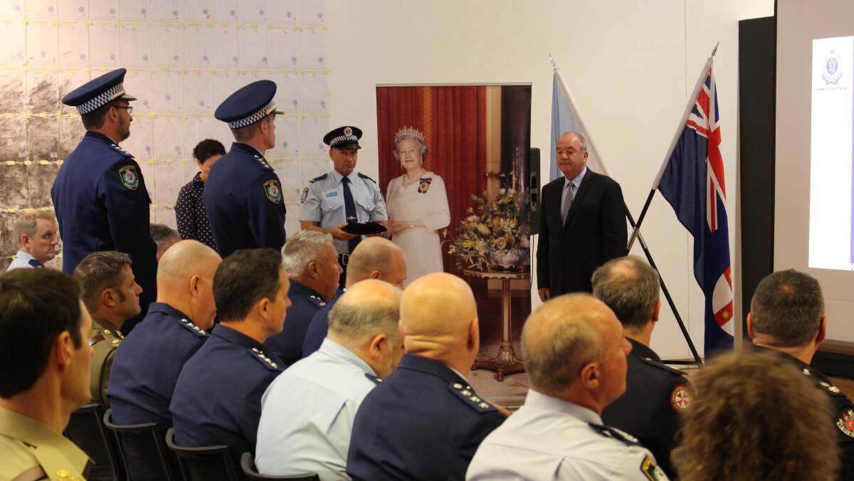STAND-UP: Officers gather at the Wagga Art Gallery on Monday for the 2017 Wagga Local Area Command awards ceremony.