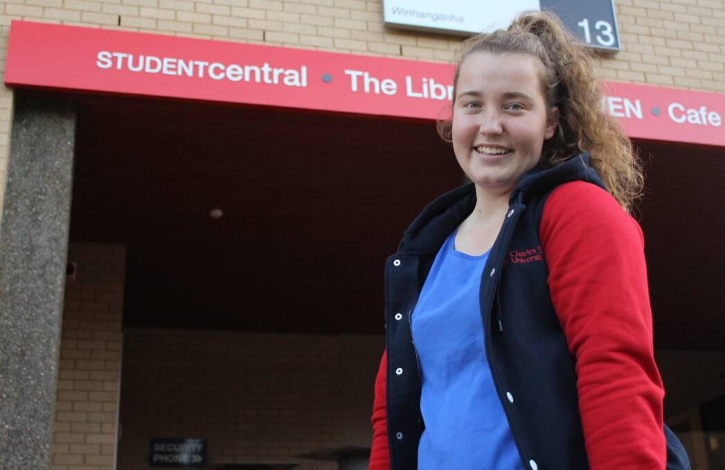 SCEPTICAL SMILES: CSU student Lyndal Jennings is ecstatic to see deregulated fees shelved, but she is still worried about impending cuts to universities. 