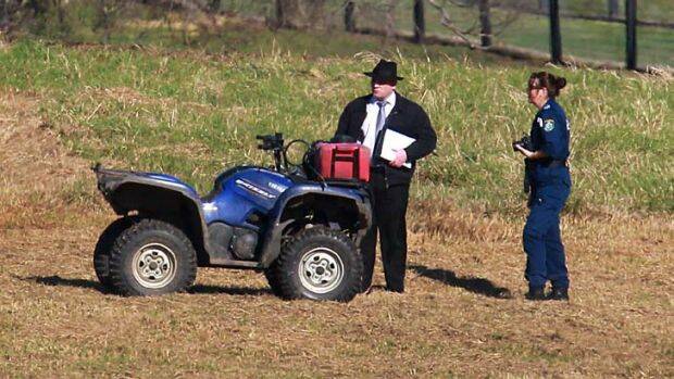 Generic photo of police inspecting a quad bike. 