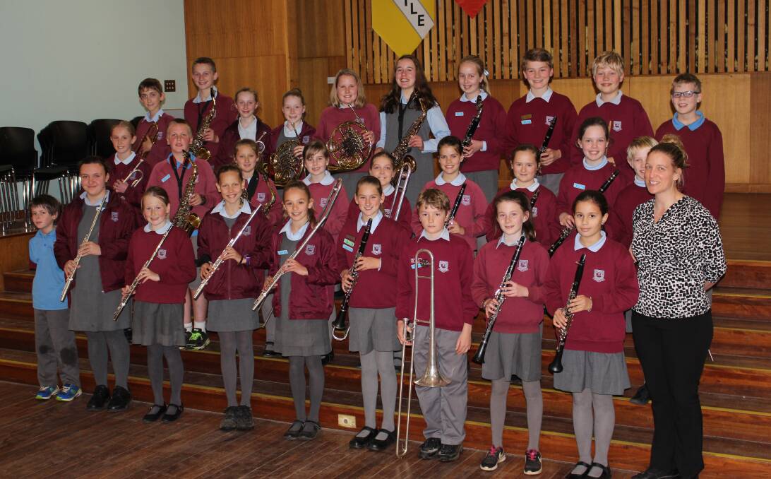 MAKING MUSIC: Kooringal Public's band students earned a gold commendation after 27 of them travelled to Sydney to test their prowess against a number of metropolitan schools. 