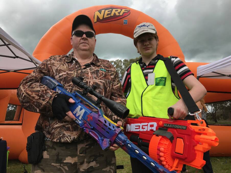 Locked and loaded: Mal Felby from Nerfsalot Canberra and Riverina Dart Tag player Bradley Arbuckle at the Riverina Truck show and Kids Convoy.