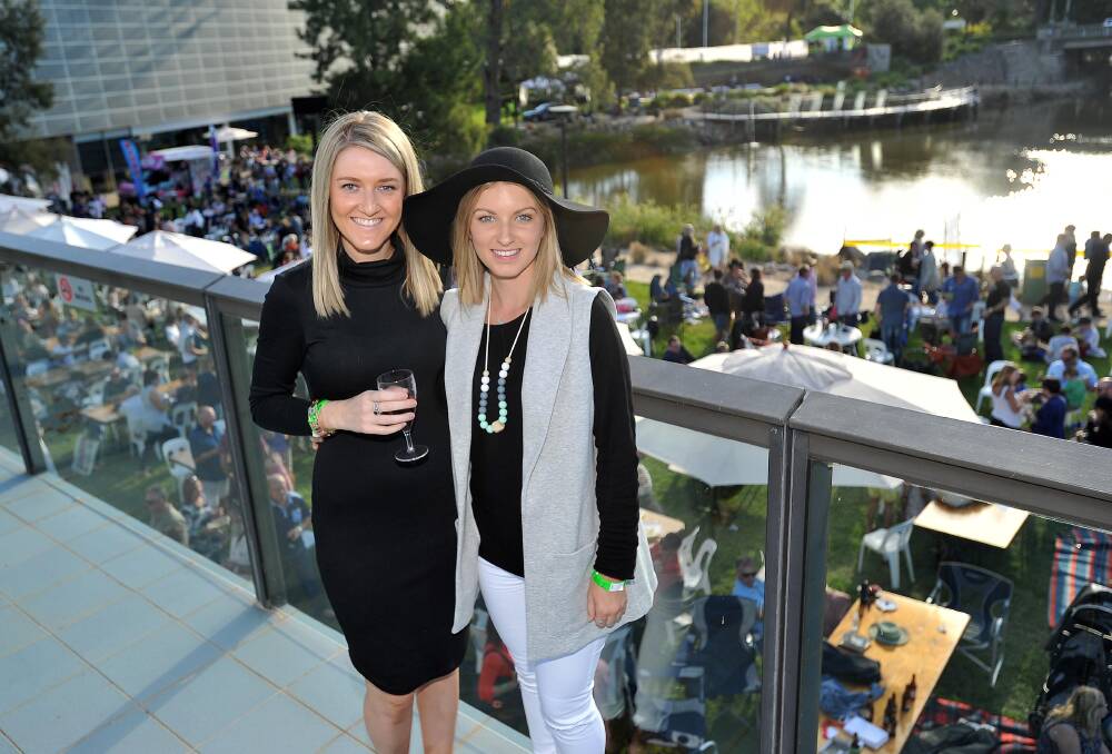 Good eats: Jes Miller and Charlie Thurlow at the Wagga Food and Wine Festival last year at the Civic Precint. Picture: Laura Hardwick.