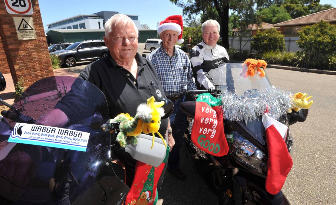 Christmas joy: Ben Combs, David Kennedy and Don Penbleton are looking forward to the annual toy run this Saturday. Picture: Laura Hardwick.