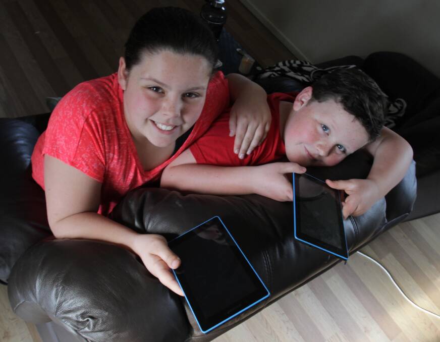 Careful use: Sophie Ramage, 11, and Zak Ramage, 9, were not allowed to use ipads when they were younger. Picture: Les Smith.