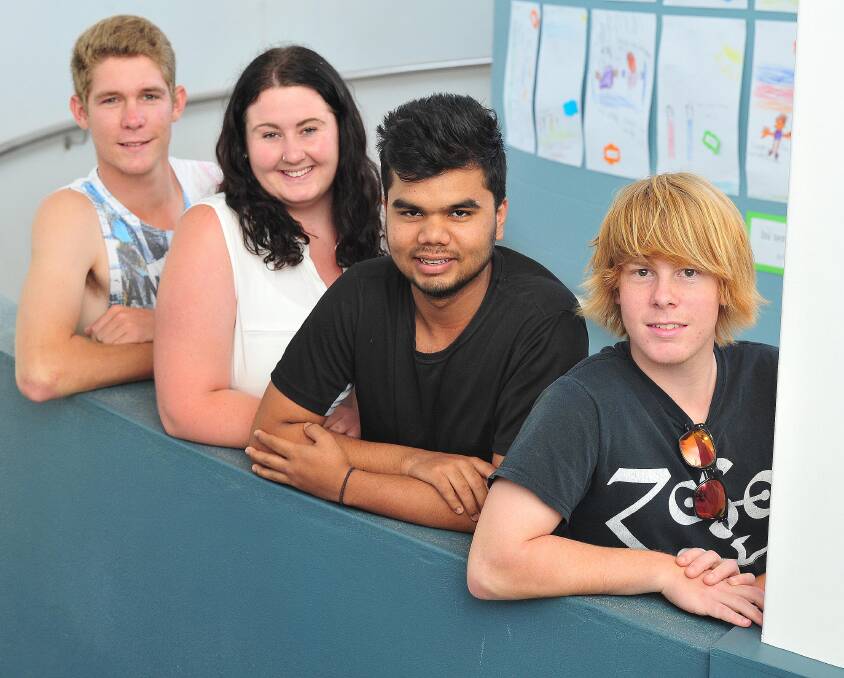 Relieved: Wagga Christian College students Trai Hildebrand, Tahlia Smith, Nishchal Suryawanshi and Ethan Weeks were pleased to have the first HSC exam out of the way. Picture: Kieren L.Tilly 