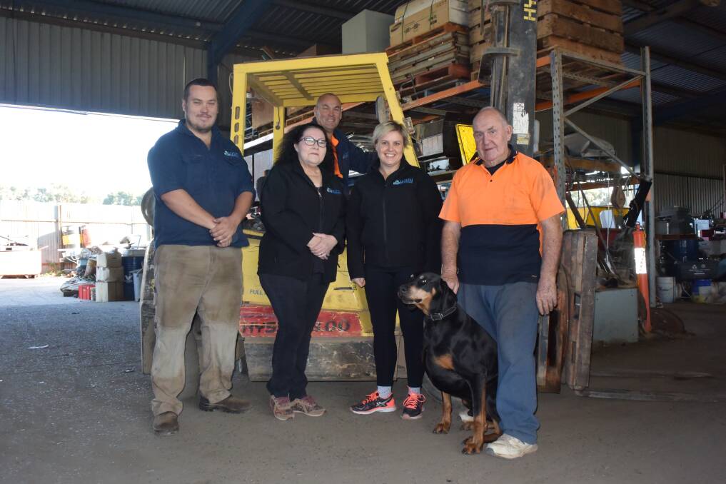 Family ties: The team behind Wagga Scrap Metals includes (left to right) Ben, April, Scott, Belinda, Laurie Coleman and the trusty guard dog Phantom. 