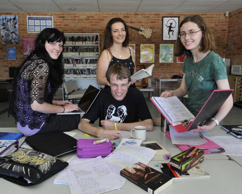 Preparation: Hannah Clarke, Marcus Ellis, Emily Hancock and Kate Ireland studying hard ahead of the HSC exams which start on October 12. Picture: Les Smith.